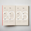Calendar open to show the years 2026 on a plain background. 2026 Diary Red | Kinshipped |Shop Fodder
