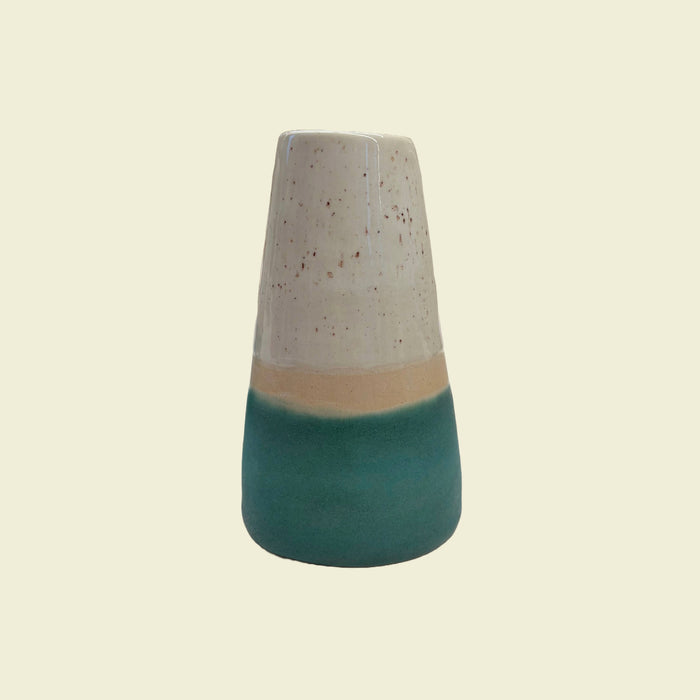 A conical ceramic vase with a fluted design, featuring a beige and green color scheme. Fluted Ceramic Vase | Jode Pankhurst | Shop Fodder