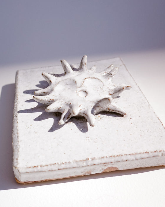 Close up of raised sun and glaze texture - Lily Pearmain | Fodder