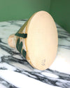 the bottom of a handmade ceramic vase showing the maker mark of Sophie Alda. 