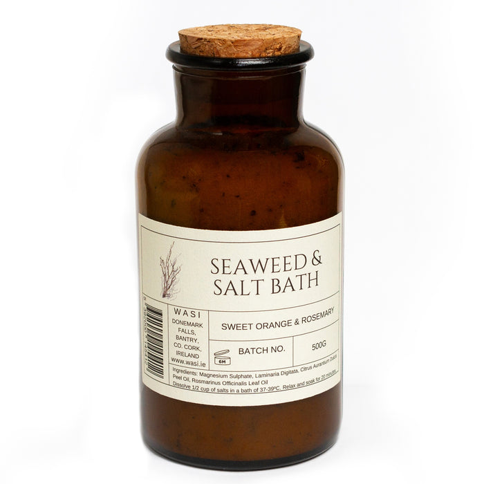Brown glass bottle with cork lid labeled 'Seaweed & Salt Bath' on a white background | Handmade Seaweed Bath Salts | WASI Seaweed | Shop Fodder