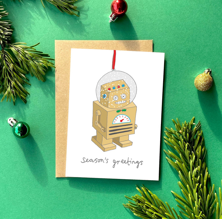 Christmas card with a hanging robot ornament. 
